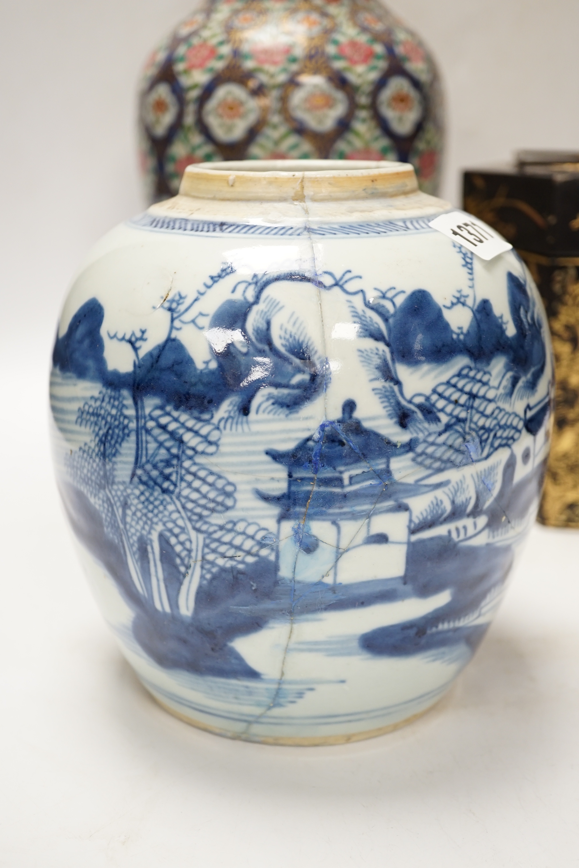 A group of Chinese items including a hardwood carving of luohan, an 18th century blue and white jar, a lacquer box, etc.